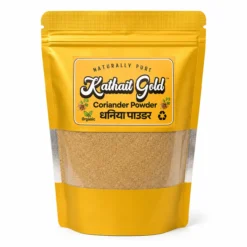 Kathait Gold Coriander Powder in a premium yellow stand-up pouch with a transparent window showing the finely ground organic dhaniya powder, isolated on a white background.